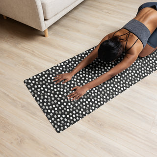 Yoga mat with black-gray dots pattern - cushioned, tactile, and made for smooth, comfortable movement