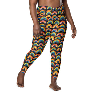 Stretchy crossover leggings for fluid yoga flow, balance, and breathe - styled in bold bright rainbows