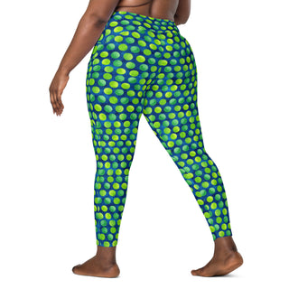 Crossover leggings built for gym sets and running stride - styled with bold green-blue dots for powered energy