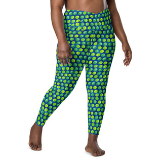 Stretchy crossover leggings for fluid yoga flow, balance, and breathe - styled in bold green-blue dots