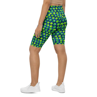 Power through each stride in blue-green dots shorts - confident, free, and fully alive in motion