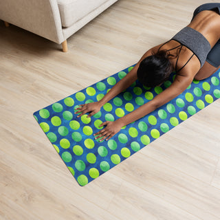 Yoga mat with green-blue dots pattern - cushioned, tactile, and made for smooth, comfortable movement