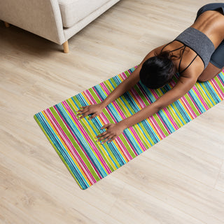 Yoga mat with green-pink stripes pattern - cushioned, tactile, and made for smooth, comfortable movement
