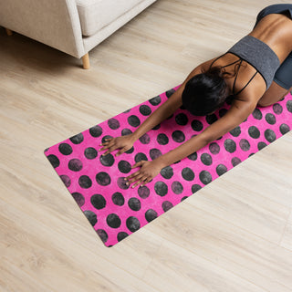 Yoga mat with neon pink black dots pattern - cushioned, tactile, and made for smooth, comfortable movement