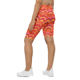 Power through each stride in pink-orange rainbows shorts - confident, free, and fully alive in motion
