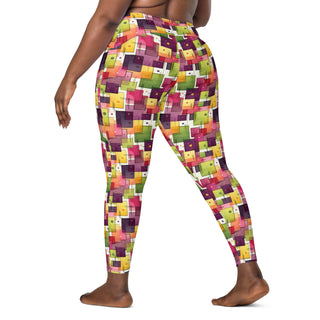 Crossover leggings built for gym sets and running stride - styled with bold plum-green squares for powered energy