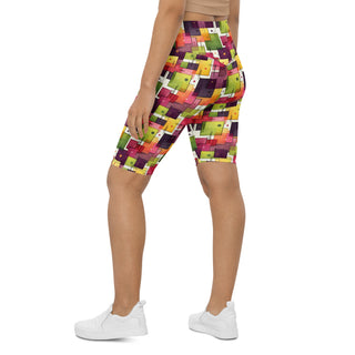 Power through each stride in plum-green squares shorts - confident, free, and fully alive in motion