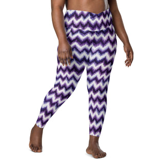 Stretchy crossover leggings for fluid yoga flow, balance, and breathe - styled in bold purple zigzags