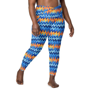 Stretchy crossover leggings for fluid yoga flow, balance, and breathe - styled in bold retro blue orange waves