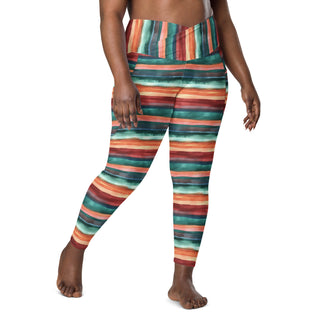 Stretchy crossover leggings for fluid yoga flow, balance, and breathe - styled in bold teal-terracotta stripes