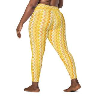 Crossover leggings built for gym sets and running stride - styled with bold yellow zigzags for powered energy